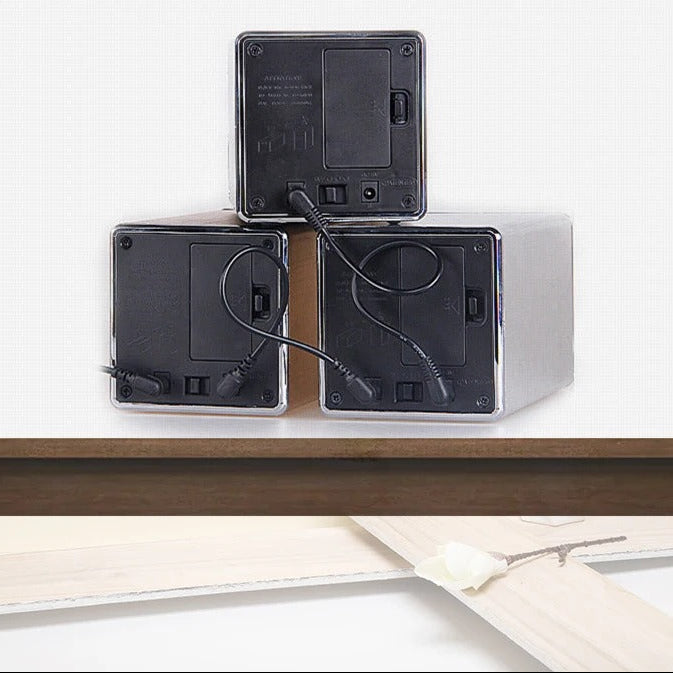Three watch winders stacked together showing their connectivity and power source.